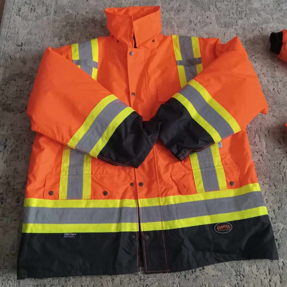 Get it all with this Hi-Viz 100% Waterproof 6-In-1 Parka.
